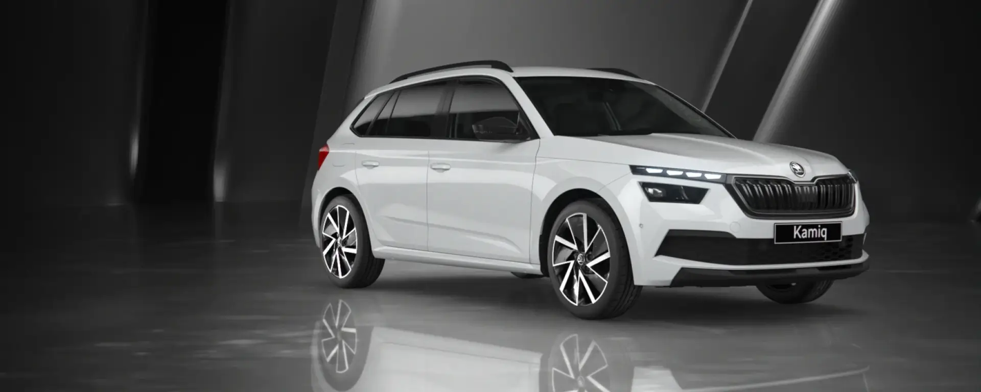 slider Kamiq Black Dots